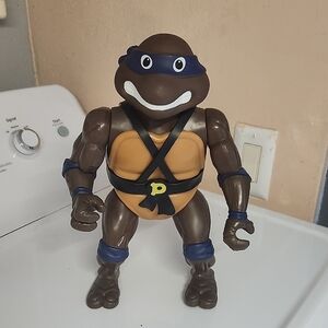 Brown and Blue Reptile Action Figure